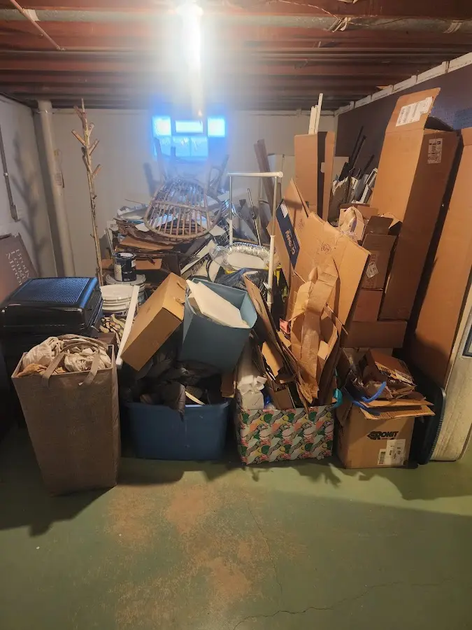 Roll-off dumpster container at job site for Cleanout Dumpster Rental in Van Buren